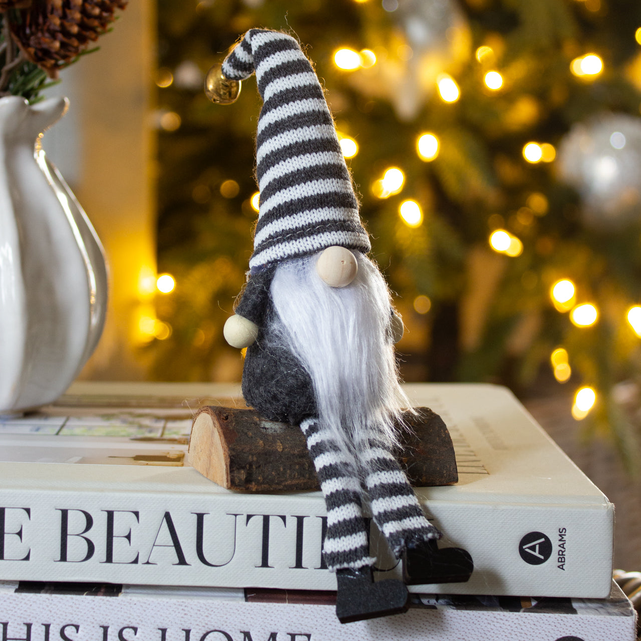 Grey & White Gonk Sitting On Log